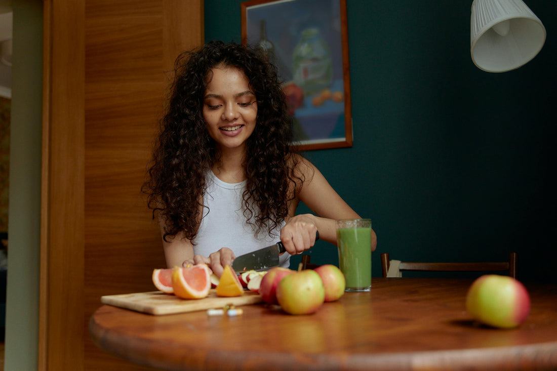 Woman Slicing Pomelo Fruit