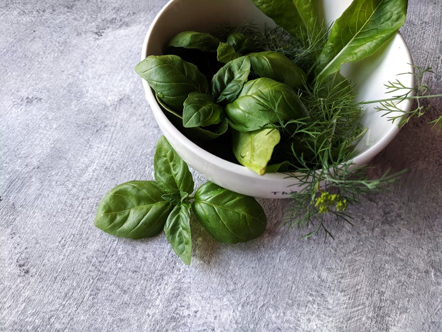 Fresh alkaline herbs and leafy greens — the foundation of Dr. Sebi's approach to digestive wellness