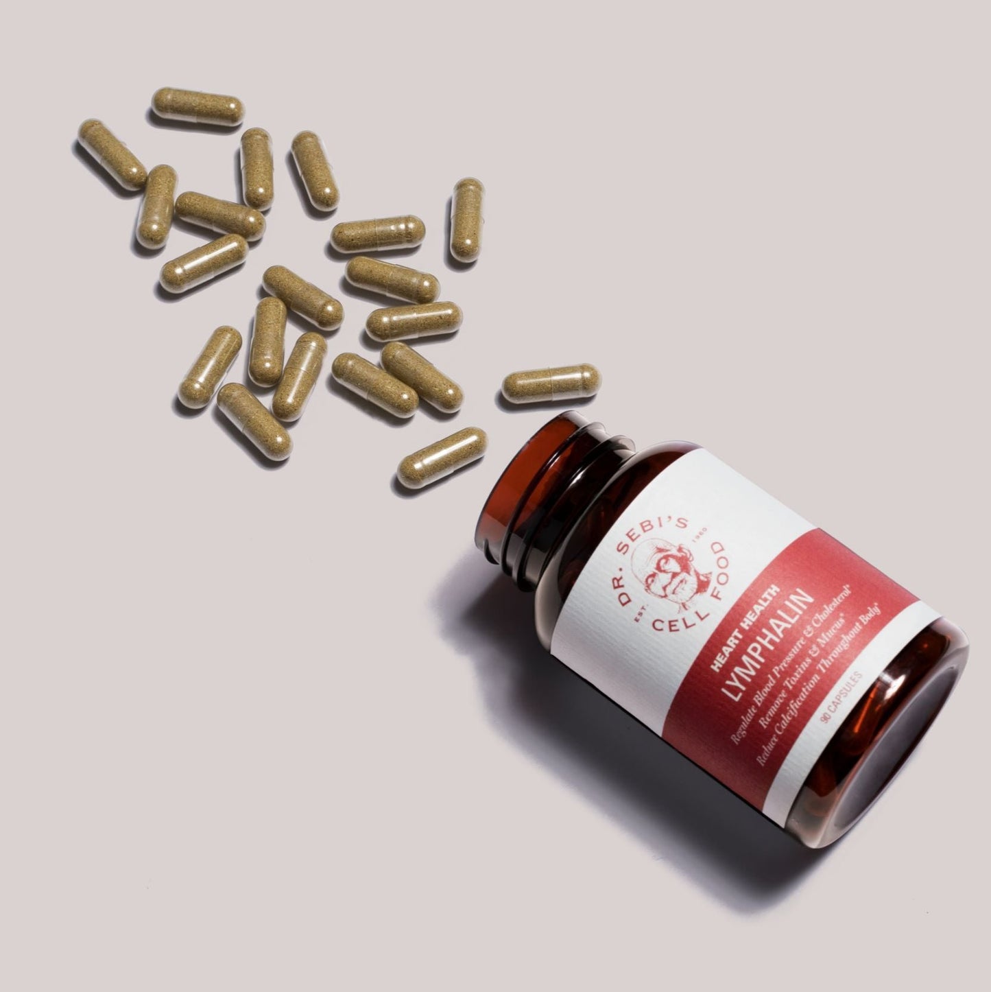 Dr. Sebi's Lymphhaim capsules displayed with loose herbal supplements on a neutral background.
